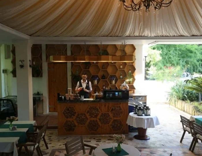 Кафе в саду - Комплекс ODISSEYA Wellness Resort / Одиссея Велнес Резорт